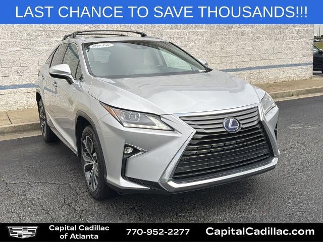 2016 Lexus RX 450h in Silver — front three-quarter view