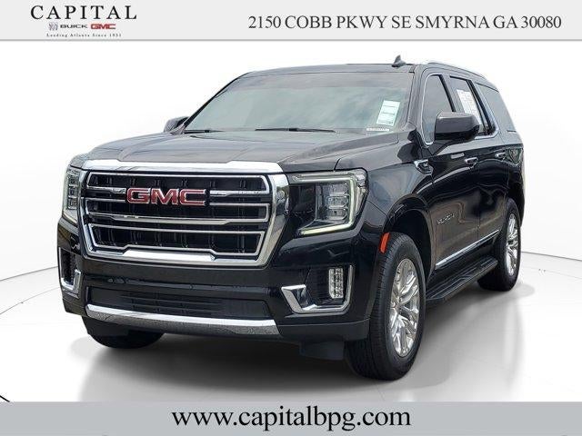 2023 GMC Yukon SLT in Onyx Black — front three-quarter view