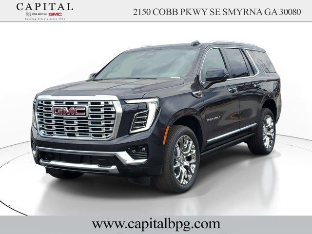 2026 GMC Yukon Denali in Titanium Rush Metallic — front three-quarter view