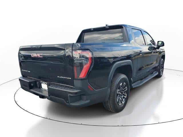2026 GMC Sierra EV — rear three-quarter view