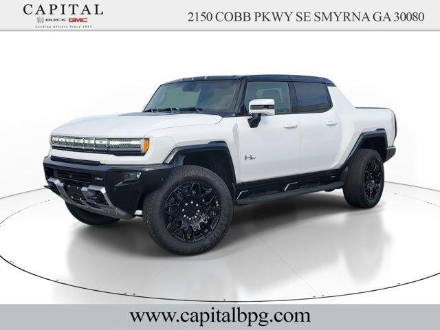 2025 GMC HUMMER EV Pickup 2X in Interstellar White — front three-quarter view