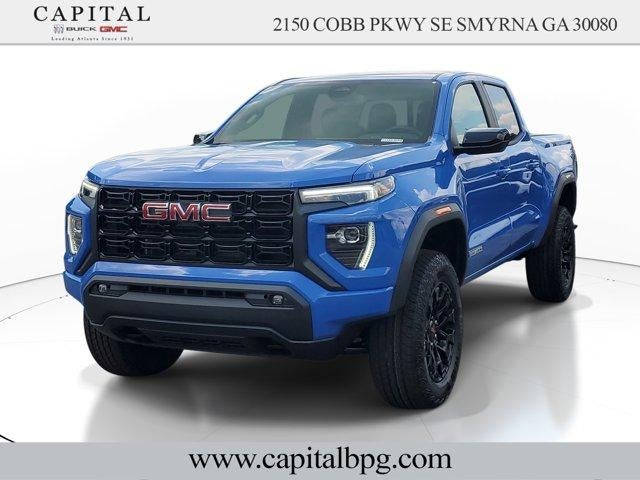 2026 GMC Canyon Elevation in Rapids Metallic — front three-quarter view