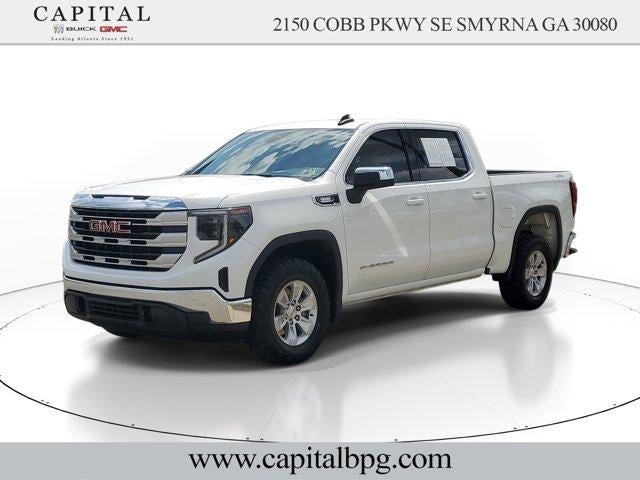2023 GMC Sierra 1500 SLE in Summit White — front three-quarter view