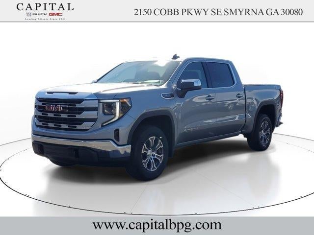 2026 GMC Sierra 1500 SLE in Sterling Metallic — front three-quarter view