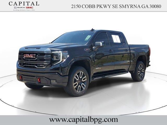 2024 GMC Sierra 1500 AT4 in Onyx Black — front three-quarter view
