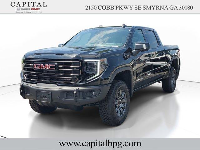 2026 GMC Sierra 1500 AT4X in Onyx Black — front three-quarter view