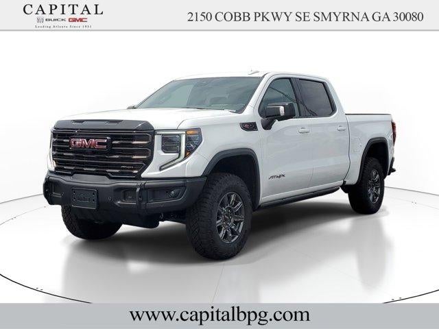 2026 GMC Sierra 1500 AT4X in Summit White — front three-quarter view