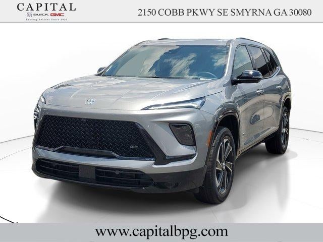 2026 Buick Enclave Sport Touring in Moonstone Gray Metallic — front three-quarter view