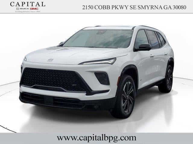 2026 Buick Enclave Sport Touring in Summit White — front three-quarter view