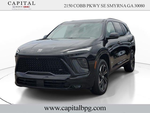 2026 Buick Enclave Sport Touring in Ebony Twilight Metallic — front three-quarter view